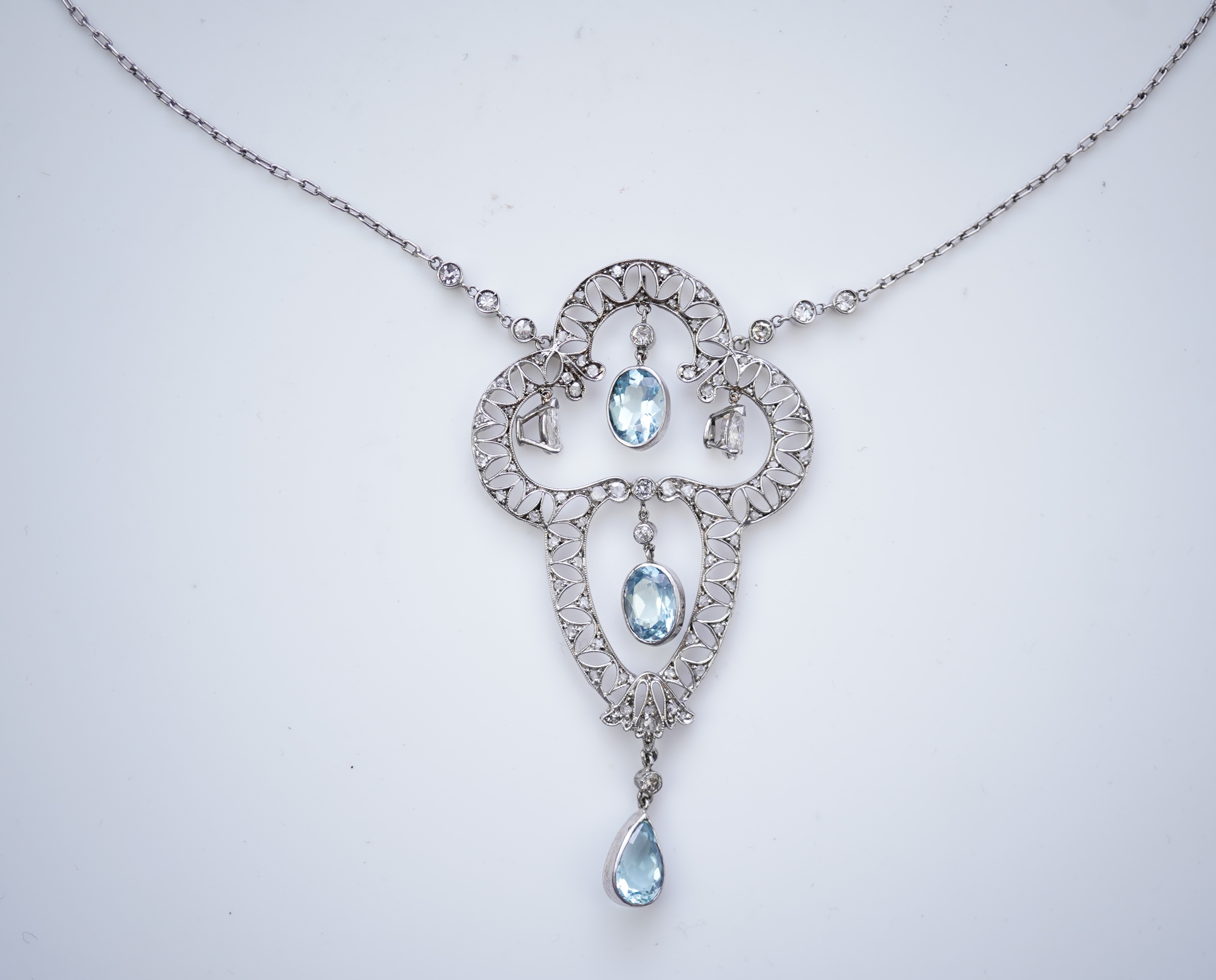 An Edwardian aquamarine and diamond pendant, circa 1910